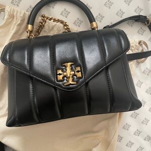 Tory Burch kira  small size is perfect condition come with dust bag
